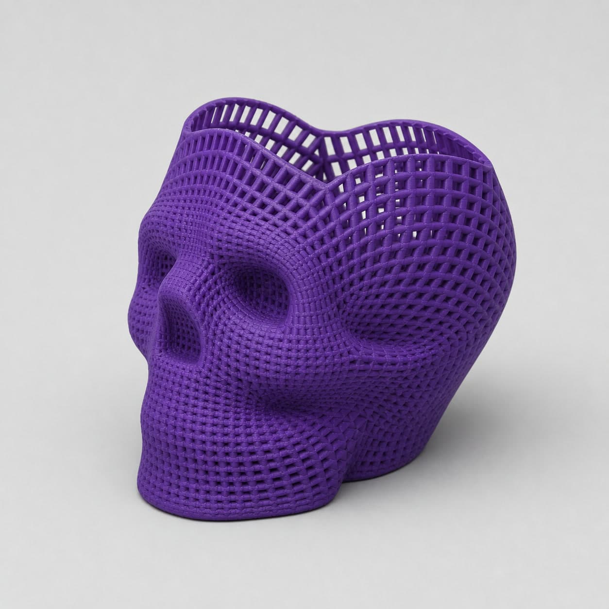 Wireframe Skull Pencil Holder. Sculpture that holds pens.
