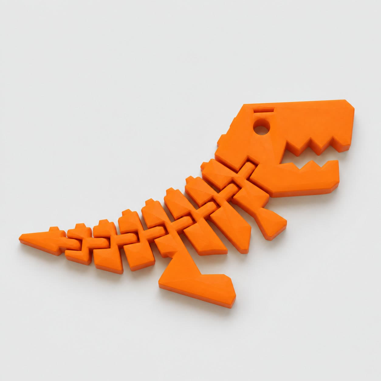 Flexi Rex. Articulated T-rex, prints in one piece.