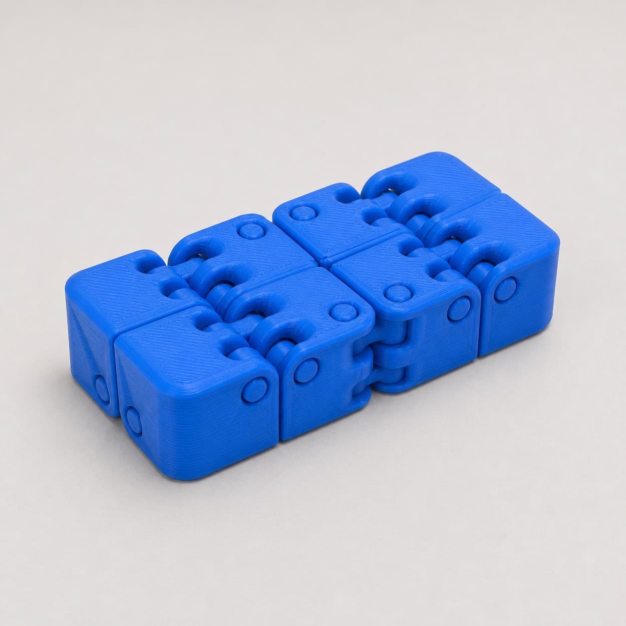 Kobayashi Fidget Cube. Fat-hinge tactile cube.