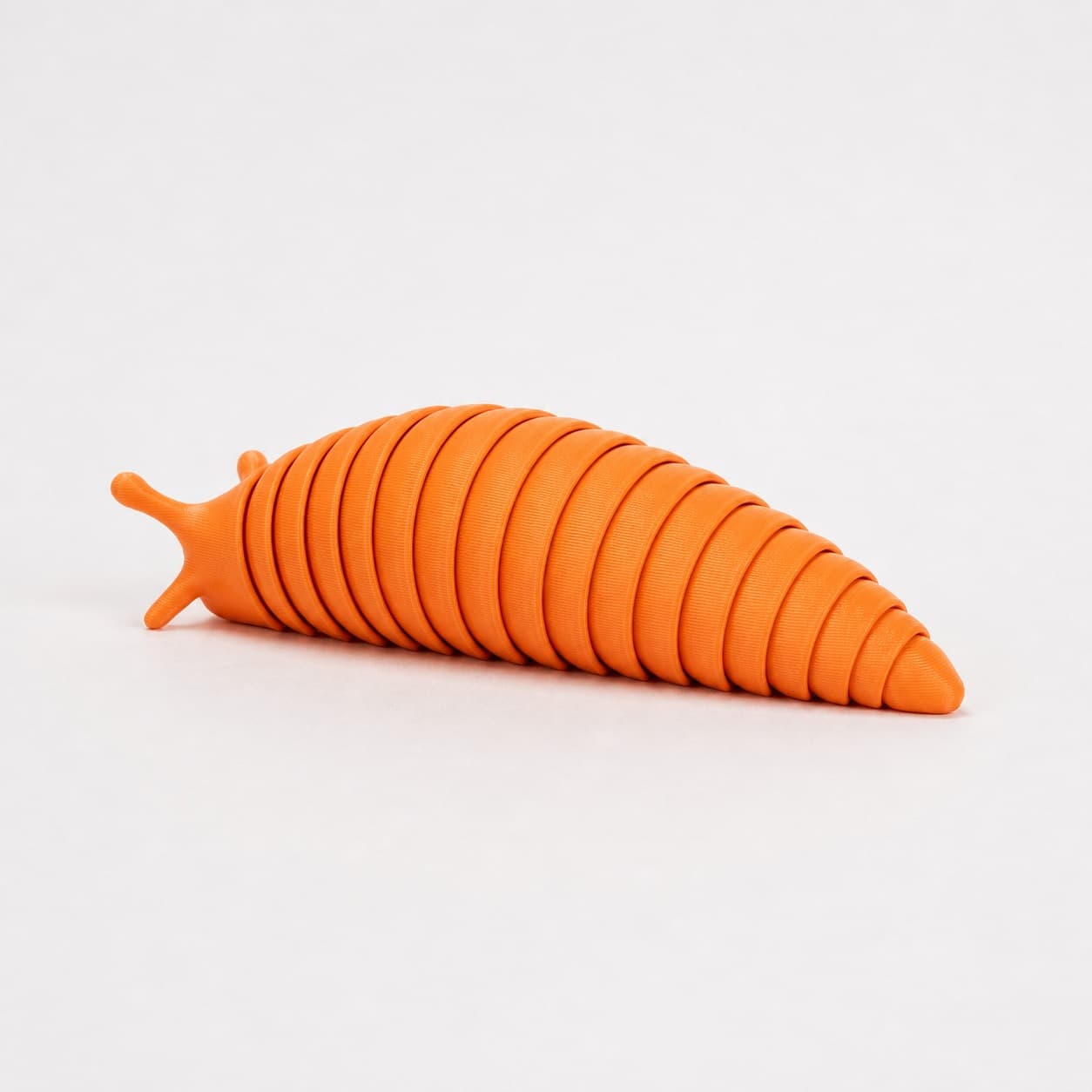 Articulated Slug. Print-in-place desk toy.